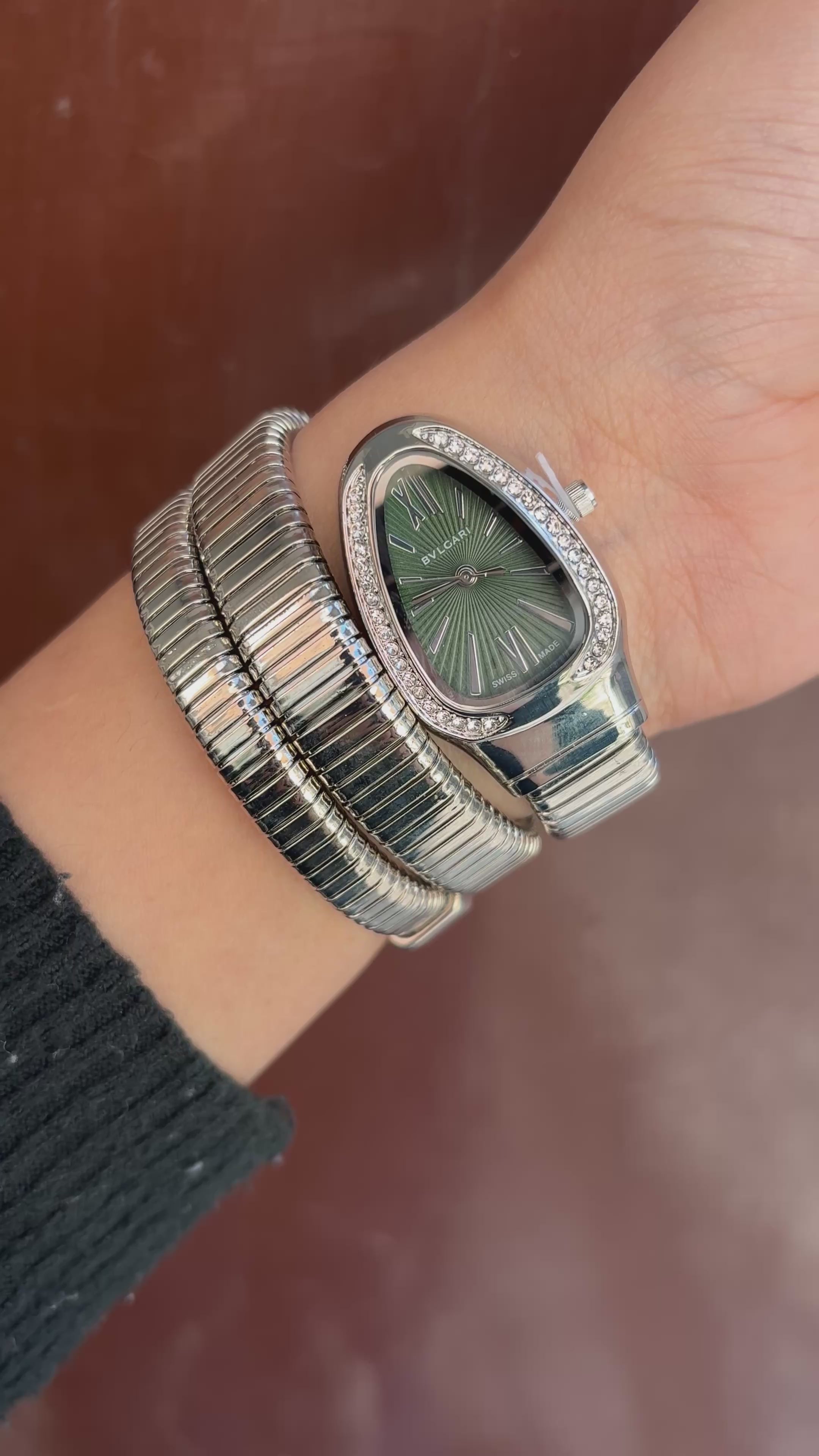 Silver Spiral watch with green dial